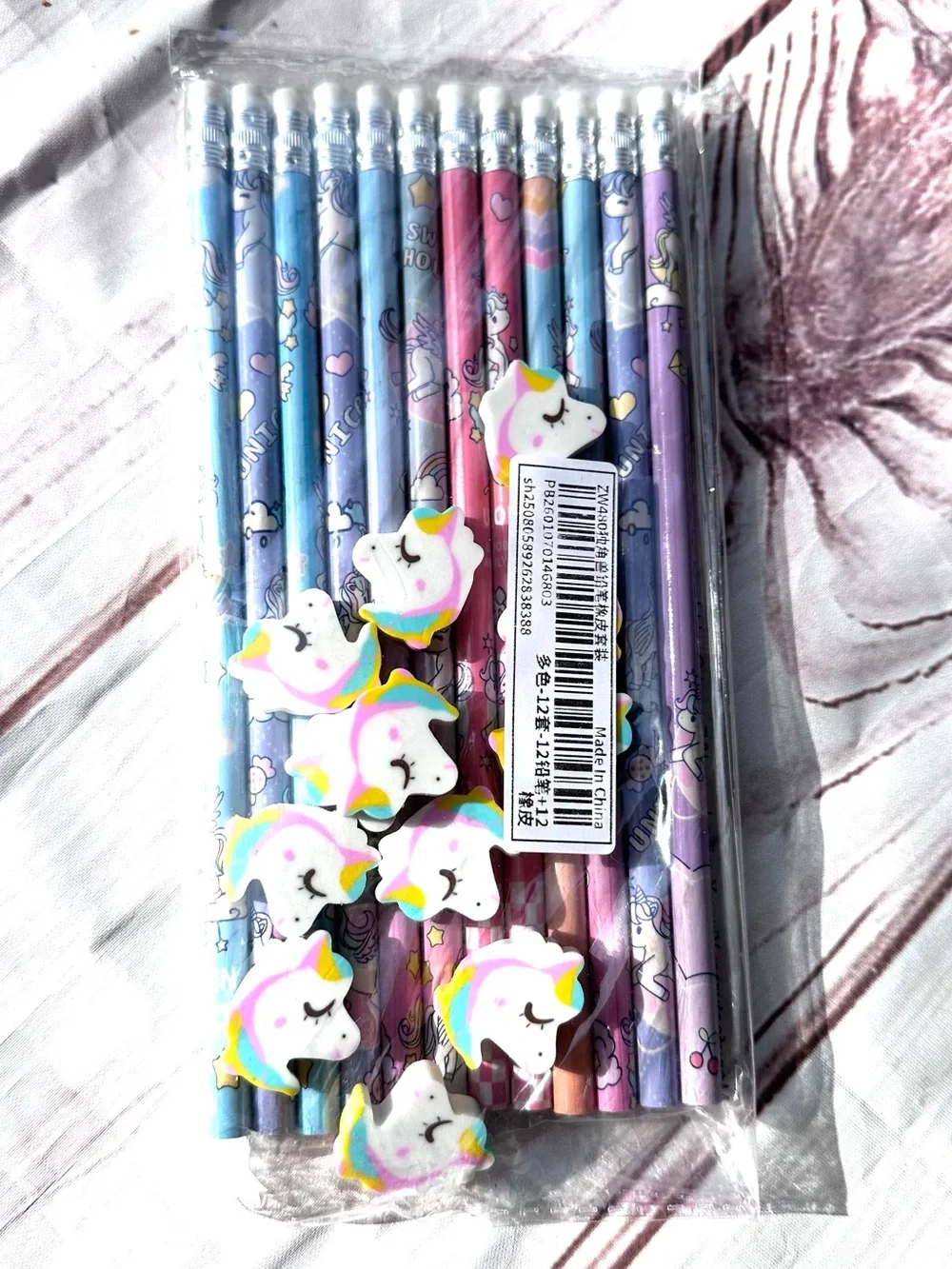 12 Rainbow Unicorn Pencil Set with Pastel Designs and Eraser Toppers